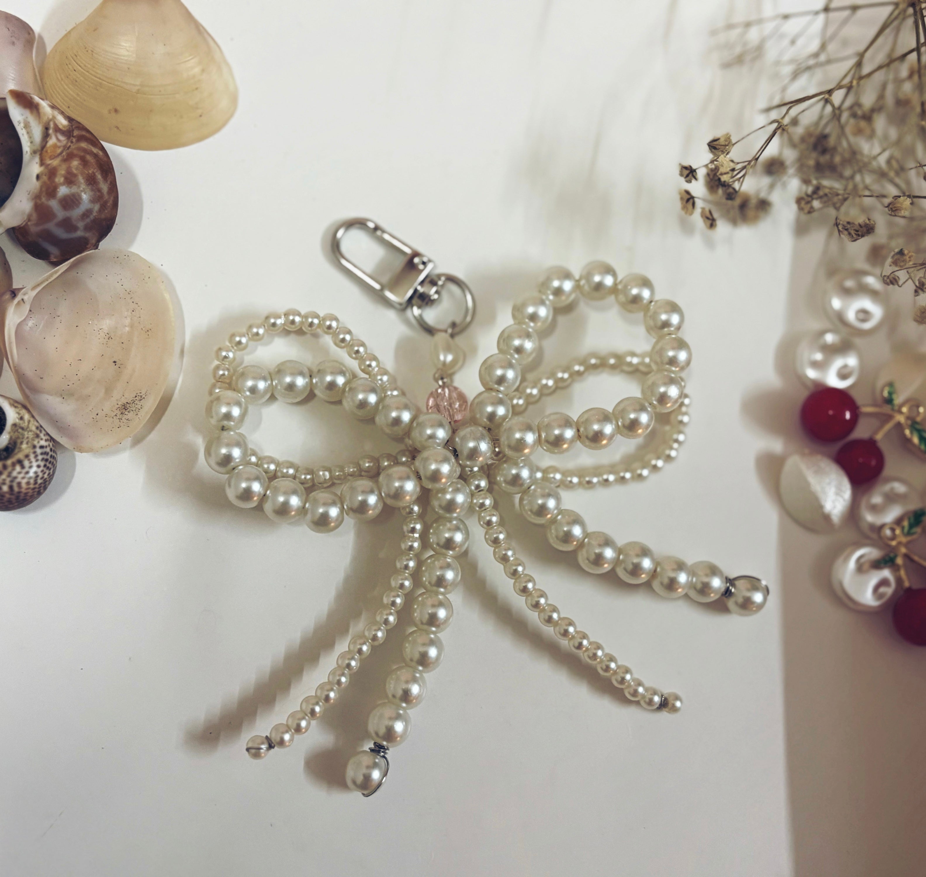 Regal Pearl Bow Keychain: A Touch of Elegance for Your Bag