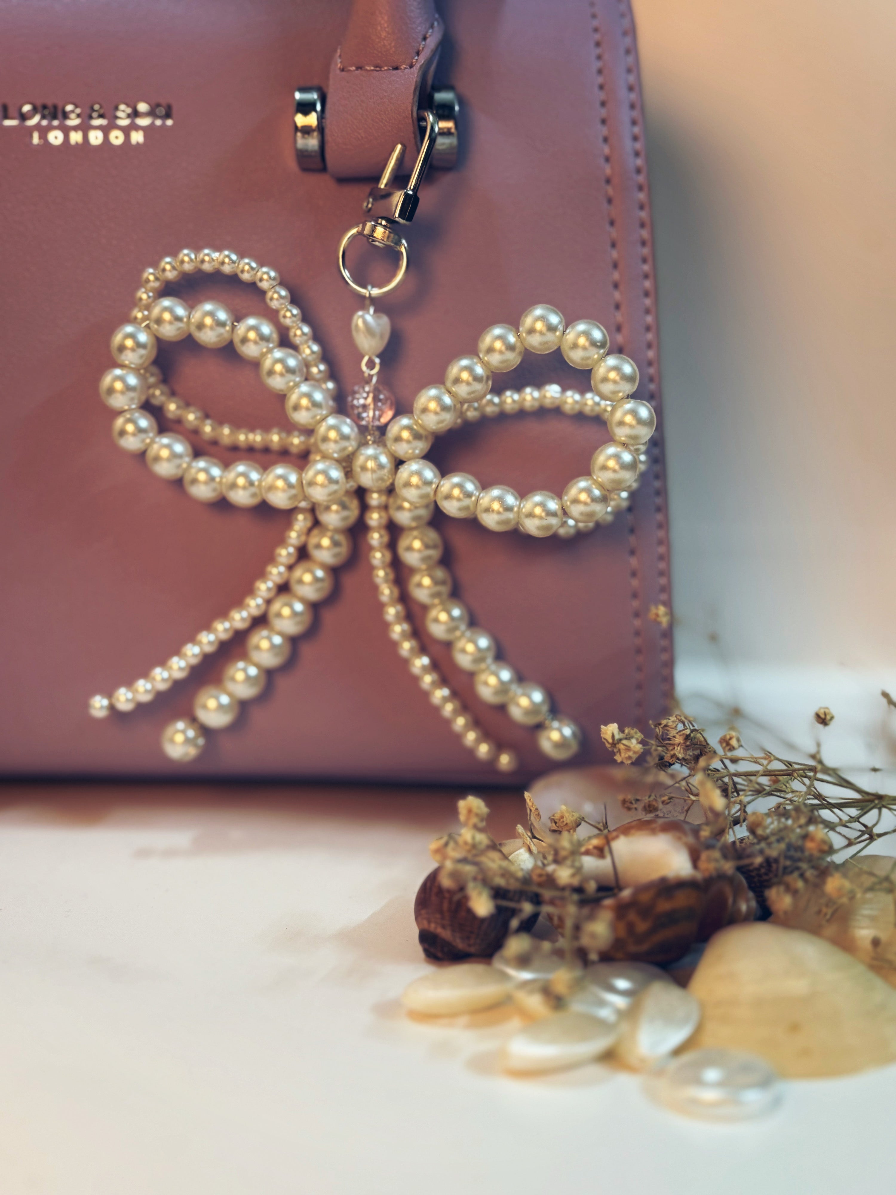 Regal Pearl Bow Keychain: A Touch of Elegance for Your Bag